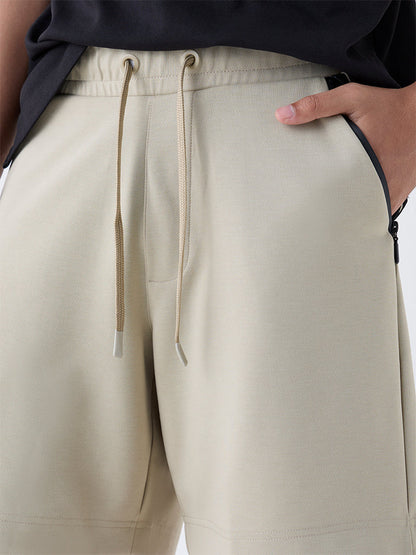 Studiofit Beige Solid Relaxed-Fit Mid-Rise Shorts