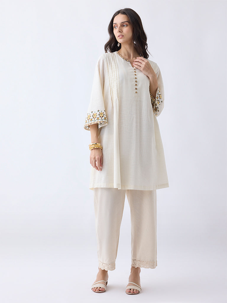 Utsa Light Beige Embroidered Cotton A-Line Kurta
