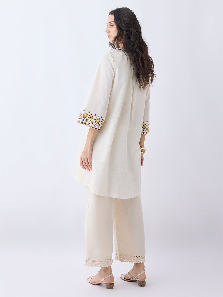 Utsa Light Beige Embroidered Cotton A-Line Kurta