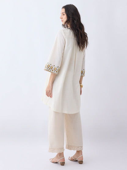 Utsa Light Beige Embroidered Cotton A-Line Kurta