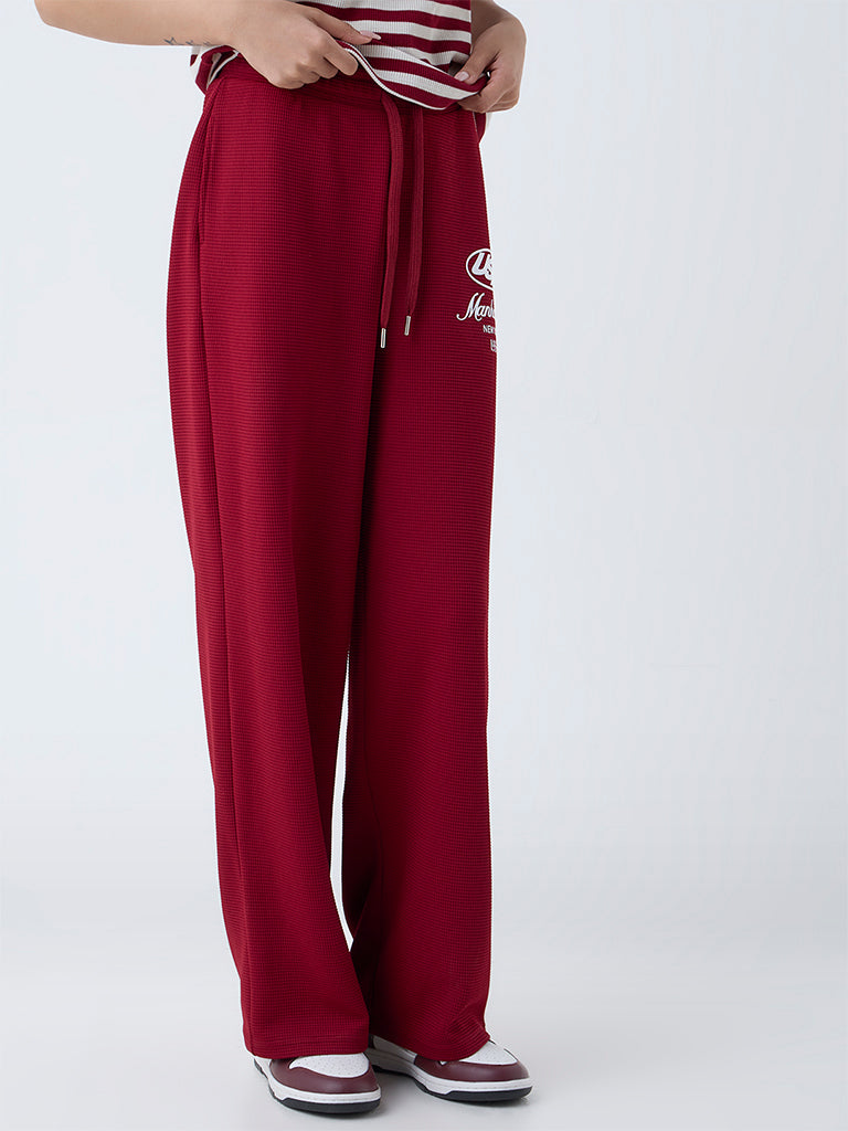 Studiofit Maroon Text Printed High-Rise Track Pants